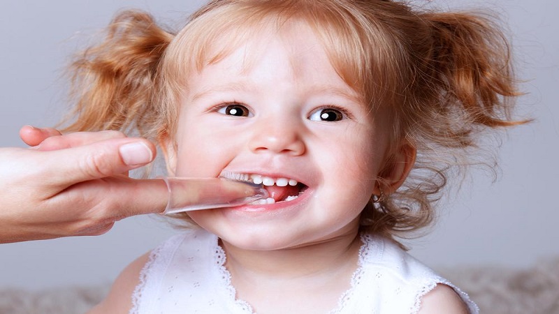 علل تغییر رنگ دندان نوزادان | دندانپزشک کودکان اصفهان